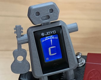 Tony, the clip on robot tuning buddy: electronic tuner for ukulele, guitar, bass, banjo or violin