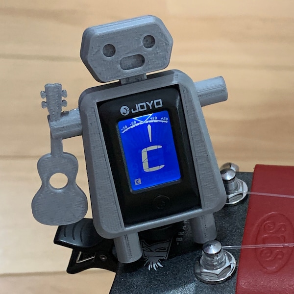 Tony, the clip on robot tuning buddy: electronic tuner for ukulele, guitar, bass, banjo or violin