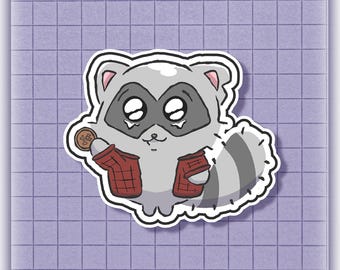 May include: A die-cut sticker featuring a cartoon raccoon with gray fur, a dark mask, and large eyes. The raccoon wears a red plaid shirt and holds a small brown coin marked with the number 1. The design has a white border outline.