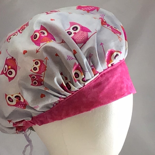 OWLS Bouffant Scrub Hat/Cap perched on an arrow/pink/gray/white/hearts in their eyes/front matched bouffant