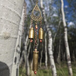 ᴅᴀɴɢʟᴇ ᴊᴀɴɢʟᴇs • glow-in-the-dark • Upcycled Bullet Shell Casing Wind Chime