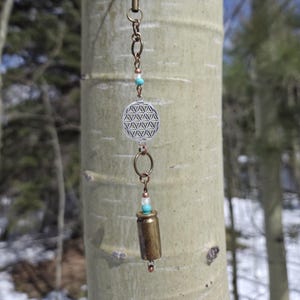 sɪɴɢʟᴇ ᴊɪɴɢʟᴇs • Flower of Life • glow-in-the-dark • Upcycled Bullet Shell Casing Mini Wind Chime