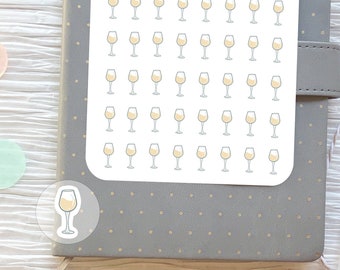 May include: A sheet of white wine glass stickers with the text "Fox and Rose Ink. White Wine" at the top. The stickers are arranged in a grid pattern.