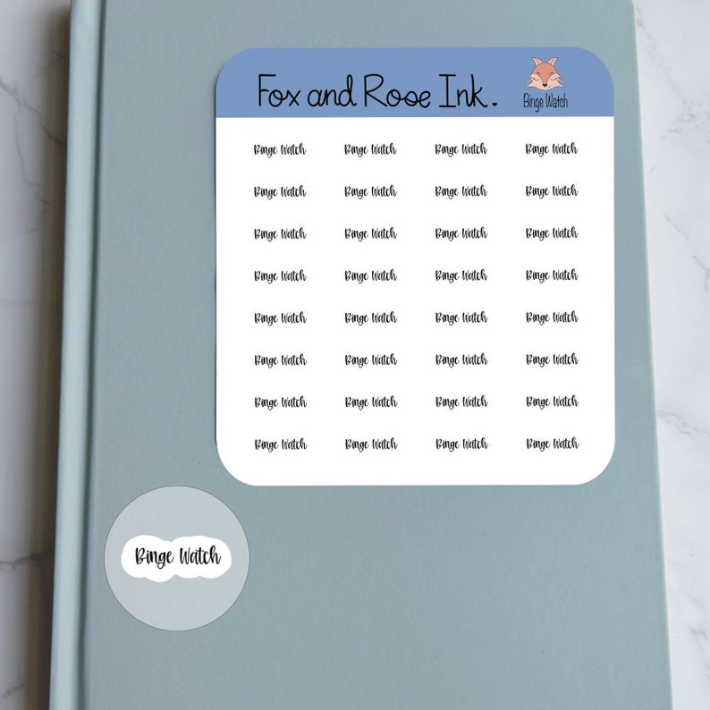 May include: A sheet of blue paper with 24 white stickers that say "Binge Watch" in black cursive writing. The sheet has a blue header that says "Fox and Rose Ink." with a small fox illustration.