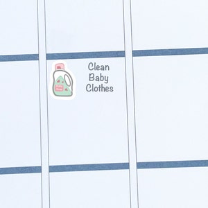 May include: A sticker with a cartoon illustration of a bottle of baby soap and the text "Clean Baby Clothes".