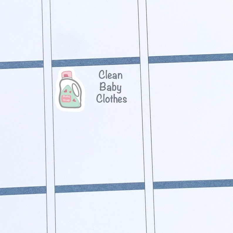 May include: A sticker with a cartoon illustration of a bottle of baby soap and the text "Clean Baby Clothes".