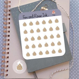 May include: A sheet of stickers featuring cartoon poop illustrations. The stickers are light brown with a wisp of steam rising from the top. The sheet has the text "Fox and Rose Ink." and the word "Poop".