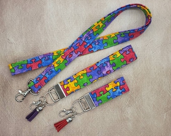 Set of 2 Autism awaredness puzzle pieces inspired keychain keyfob wristlet strap 
