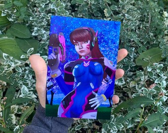 May include: A blue and pink anime character with long brown hair holding a pink and black gun. The character is standing in front of a blue and white background with a pink flower design.