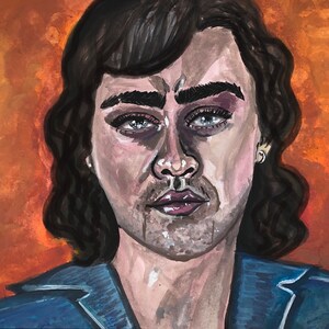 May include: A watercolor painting of a person with dark hair and blue eyes. The person is wearing a blue shirt and has a serious expression on their face. The background is a warm orange color.