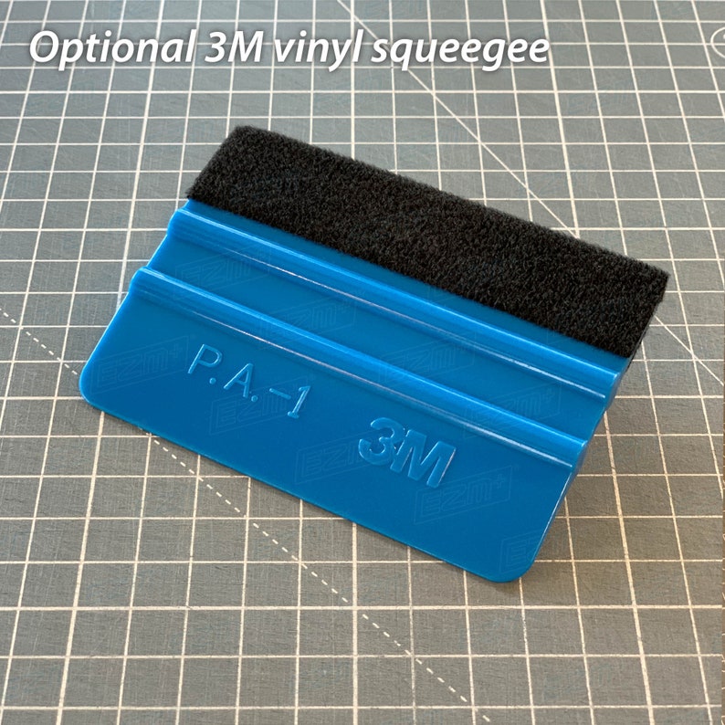 May include: Blue plastic squeegee with a black felt edge. The squeegee has the text "P.A.-1 3M" printed on it.