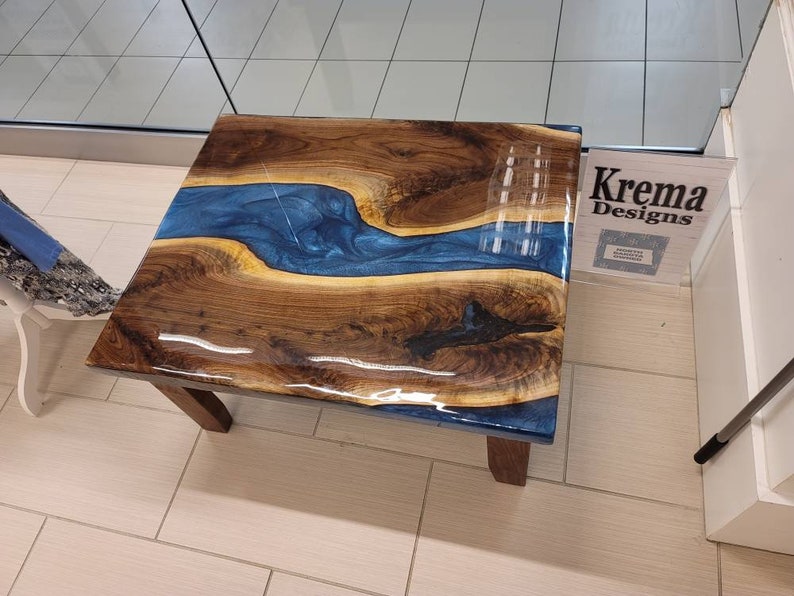 Deep pour epoxy and walnut coffee river table