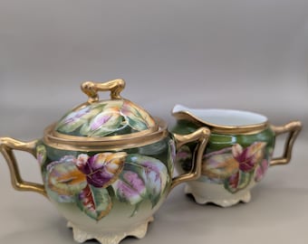Vintage porseleinen suikerpot en melkkannetje set