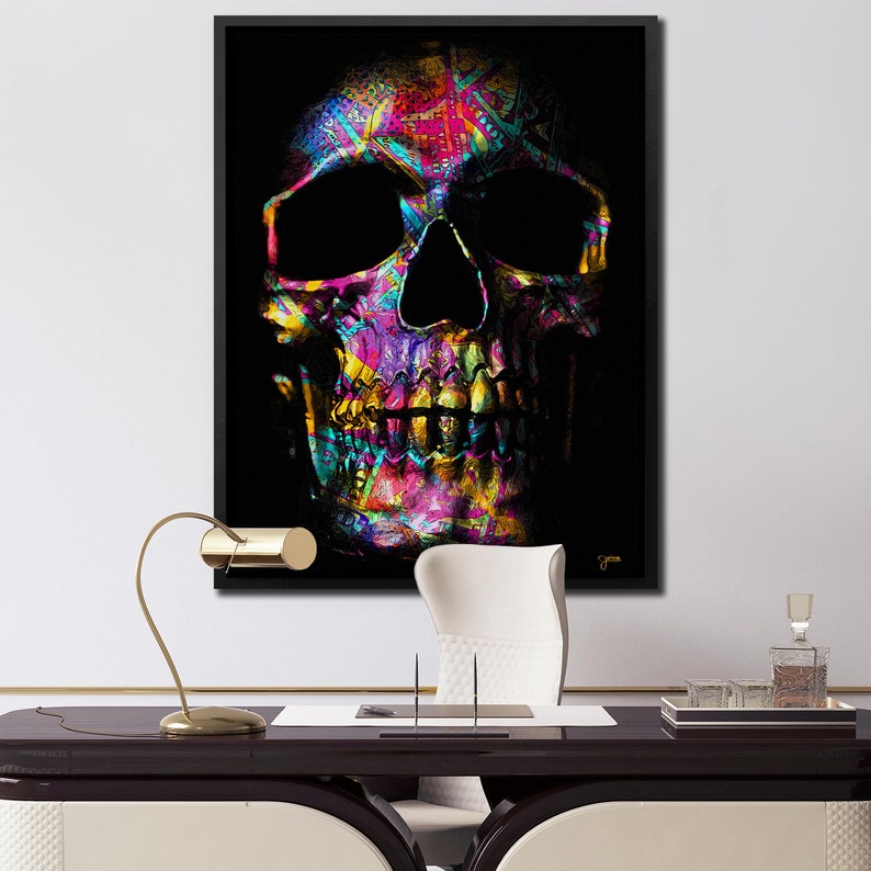 May include: A colorful skull with a black background. The skull is made up of a variety of colors, including pink, blue, green, yellow, and orange. The skull is a popular motif in art and design, and it is often used to represent death, mortality, and the cycle of life.
