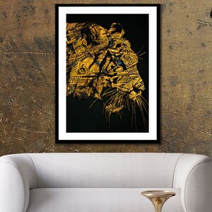 May include: A black and gold abstract art print of a tiger's face with a blue eye. The tiger is made up of dollar bills.
