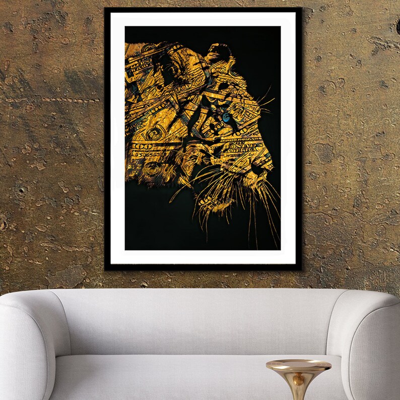 May include: A black and gold abstract art print of a tiger's face with a blue eye. The tiger is made up of dollar bills.