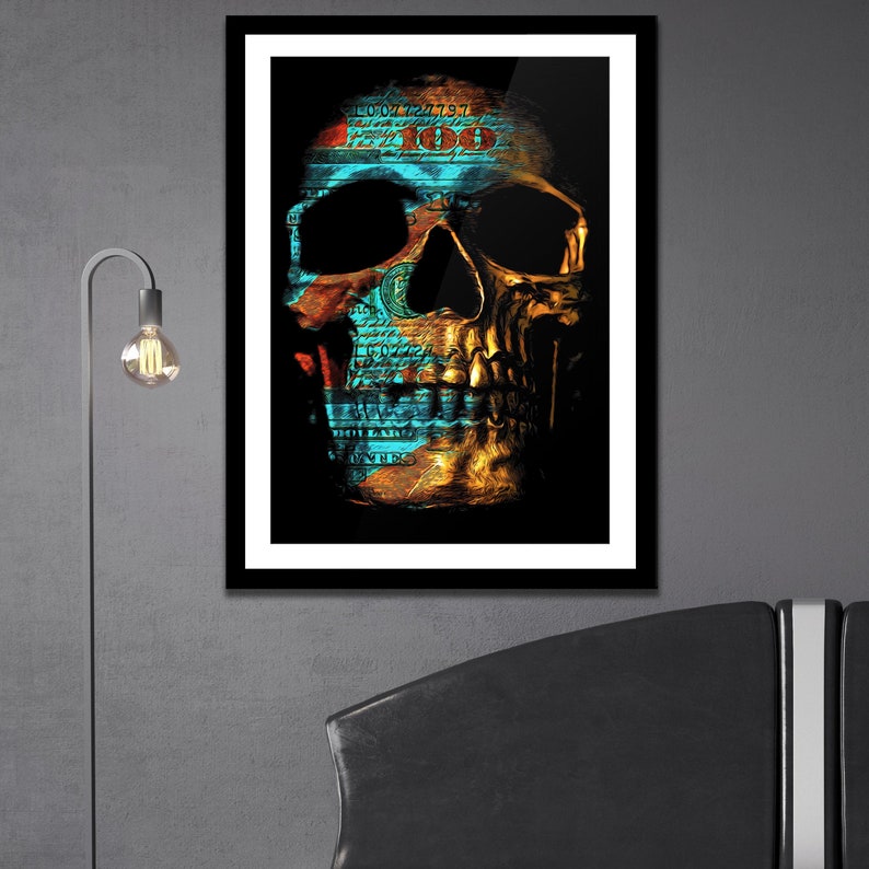 May include: A gold skull with a blue and red dollar bill pattern on its face. The skull is on a black background.