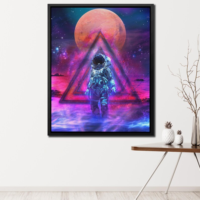 May include: An astronaut in a blue spacesuit walks through a glowing pink and blue triangle portal in a cosmic landscape with a red planet in the background.