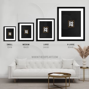 May include: Four black framed prints with white mats and a black background. The prints feature the word "DOPE" in gold lettering. The prints are labeled with their sizes: Small (12x16 inches), Medium (16x20 inches), Large (24x30 inches), and X-Large (30x40 inches). The prints are displayed on a white wall above a white sofa and a coffee table.