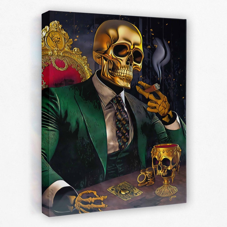 May include: A gold skull wearing a green suit and a tie sits in a chair with a cigar in its hand. The skull is holding a glass of red liquid and there are playing cards on the table in front of it.