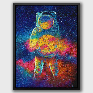 May include: A colorful abstract painting of an astronaut holding a planet in front of a galaxy background.