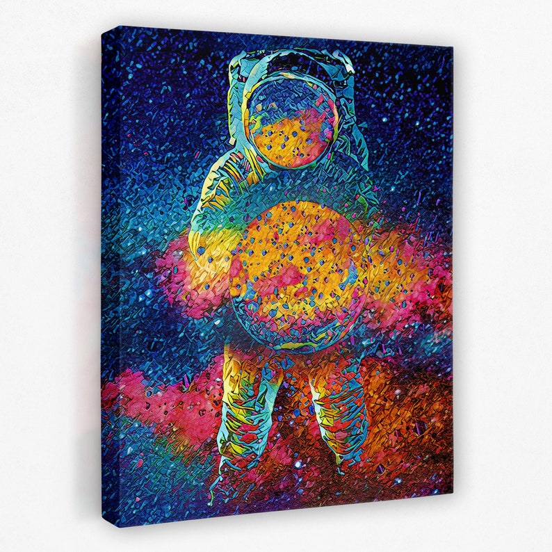 May include: A colorful abstract painting of an astronaut holding a planet in space. The astronaut is wearing a white spacesuit with a blue helmet. The planet is yellow and orange with a blue and purple nebula in the background.
