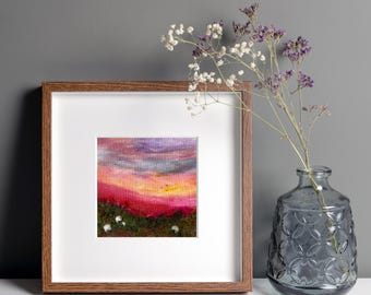 Original mixed media textile art, grazing sheep in a Yorkshire landscape beneath a colourful, handpainted sunset.