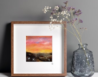 Original mixed media textile art, grazing sheep in a northern English landscape beneath a colourful sunset sky.