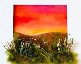 Original mixed media textile art, grazing sheep with sunset and 3 dimensional grasses