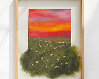 Sheep and lambs grazing in a sunset field framed art