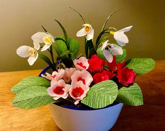 Paper spring flower arrangement in vintage enamel bowl