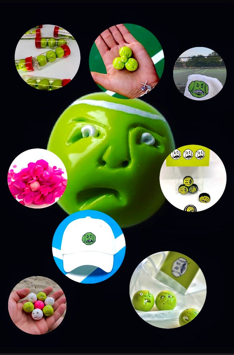 May include: A collection of green tennis balls with different facial expressions. Some balls are in a clear plastic container, others are in a hand, and some are on a white surface. There is also a white baseball cap with a green face on it.
