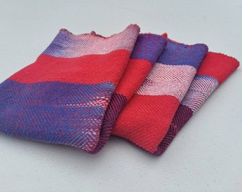 Handwoven twill towel with red weft