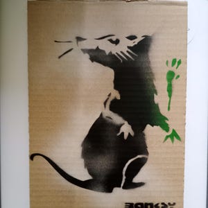Original Dismaland carton Banksy avec papiers et cadre