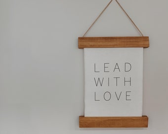 LEAD WITH LOVE: Canvas Wall Hanging