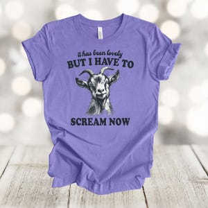 May include: Purple t-shirt with a goat illustration and the text "it has been lovely BUT I HAVE TO SCREAM NOW".