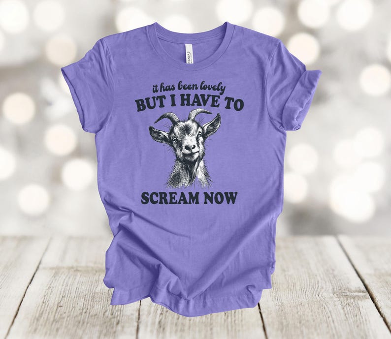 May include: Purple t-shirt with a goat illustration and the text "it has been lovely BUT I HAVE TO SCREAM NOW".