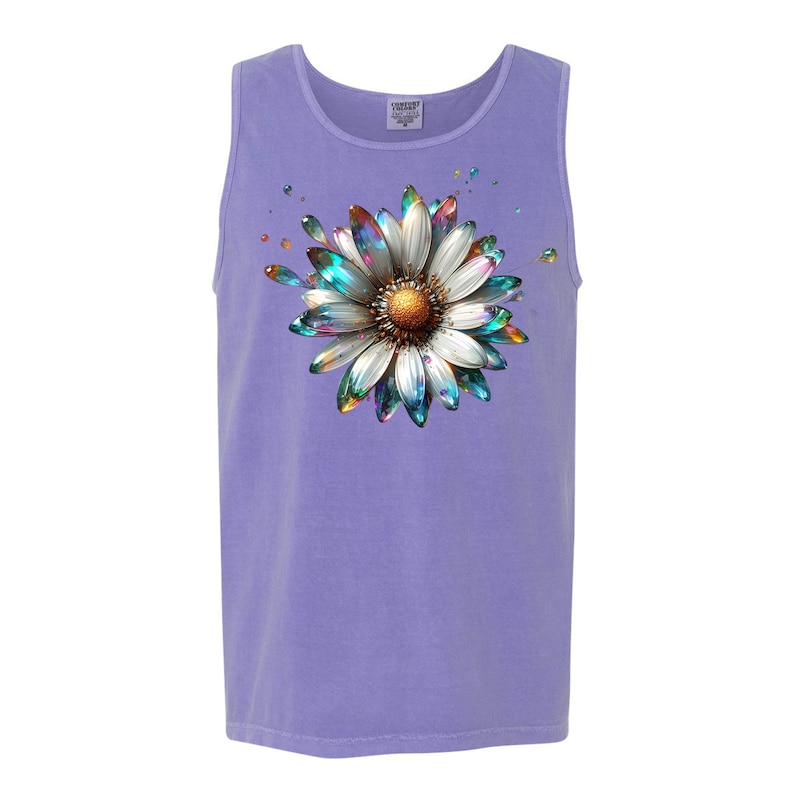 May include: A purple tank top with a colorful iridescent daisy graphic print.