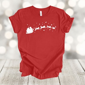 Christmas Shirt, Dogs Pulling Santa Sleigh, Dog Lover, Santa Claus, Premium Soft Unisex Shirt, Plus Sizes Available 2x, 3x, 4x