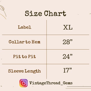 May include: Size chart for an XL shirt with measurements in inches: collar to hem 28", pit to pit 24", sleeve length 17".