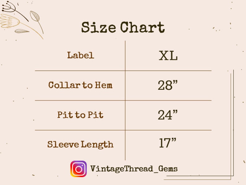 May include: Size chart for an XL shirt with measurements in inches: collar to hem 28", pit to pit 24", sleeve length 17".