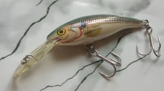 Collectible Glass Shad Rap Vintage lures Rapala Risto Rap Fat Rap Down Deep Tail Dancer Price for one lure.