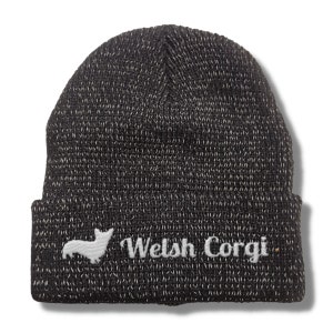 Könnte beinhalten: Schwarze Strickmütze mit weißem Rand und einer weißen Silhouette eines Welsh Corgis mit dem Text "Welsh Corgi" in Weiß.