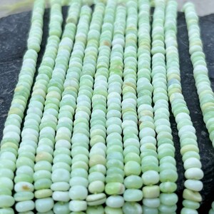 Perle di opale peruviano verde di qualità A ++ Forma di rondelle Opale verde semi prezioso Liscio, perline sciolte Perline all'ingrosso