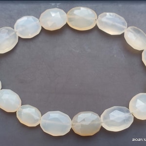 Faceted White Chalcedony Oval Beads: 5 Inch Strand