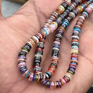 Ottima qualità! Perline di zirconi multicolor da 5,5 mm, a forma di pneumatico, con splendide pietre preziose miste, lisce, 22,7 cm.