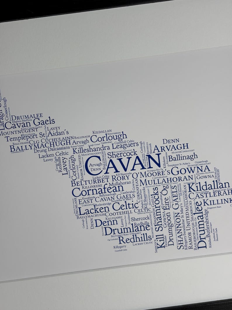 Cavan GAA Irish Themed Word Art Poster Print by Ireland With Love Printed in sizes A5 A4 and A3 offered as print only, framed or matted with all the Cavan GAA clubs listed in the Cavan colours in the shape of county Cavan this print can also be personalised