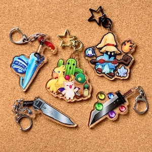 Final Fantasy Charm Keychain FF7 Cloud Buster Sword FF8 Squall Gunblade FF9 Vivi FF10 Tidus Brotherhood Chocobo Tonberry Cactaur Moogle