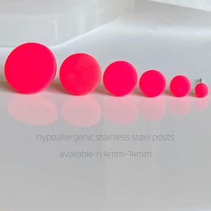 May include: Five bright pink round earrings of different sizes, hypoallergenic stainless steel posts, available in 4mm-14mm.