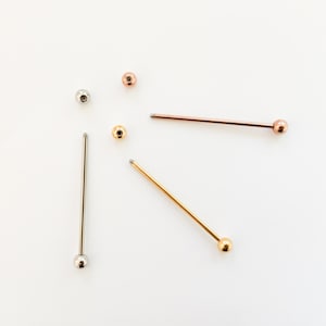 Piercing industrial tipo barra, acero quirúrgico 316L de 14 g y 38 mm, para cartílago de la oreja superior.
